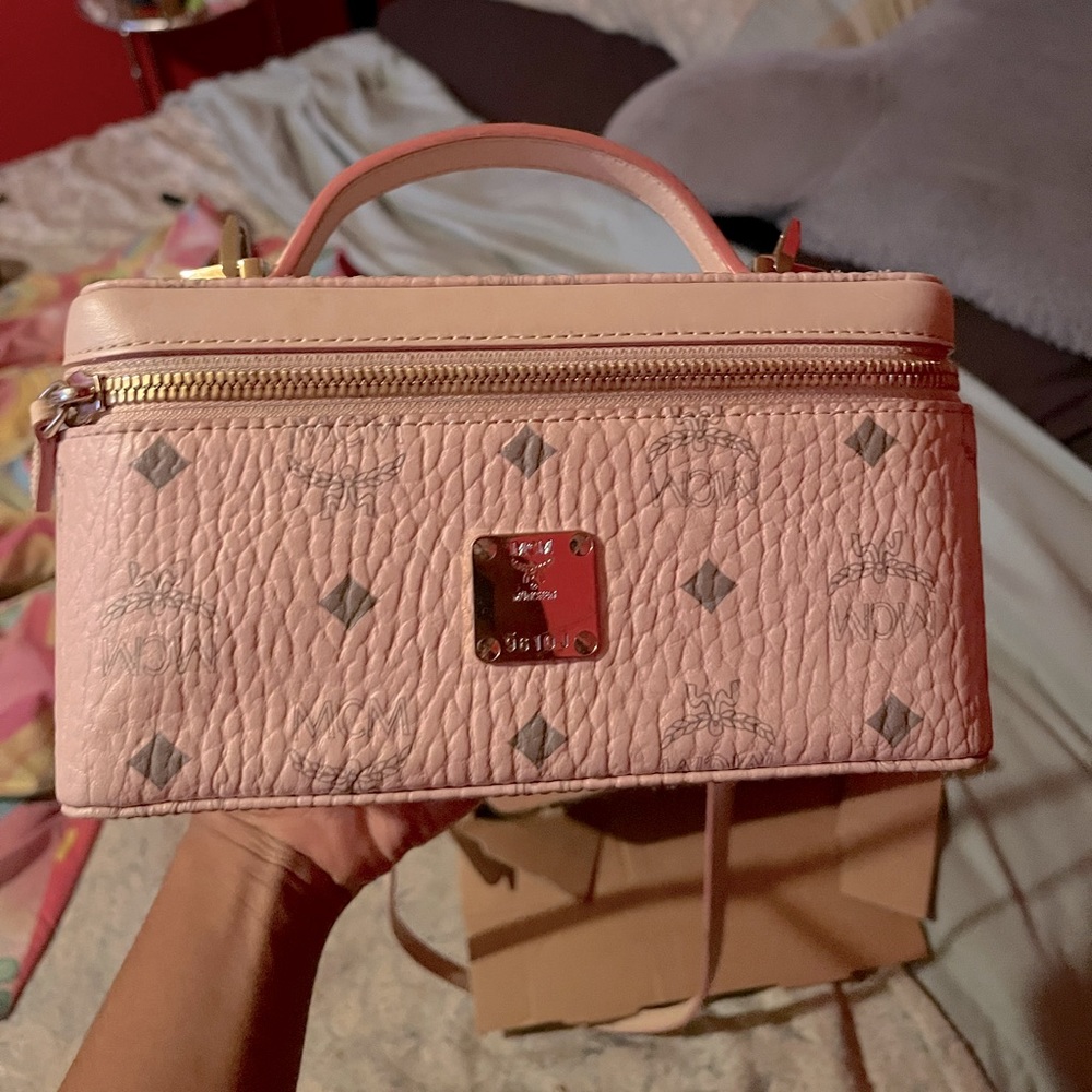 Pink nvm rockstar vanity bag.